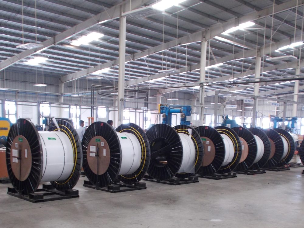 Finished cable drums staged in the manufacturing hall